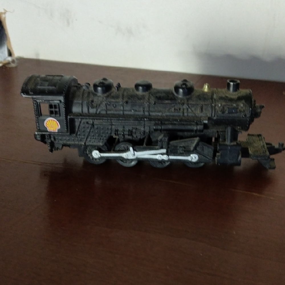 Black Model Train with Shell Logo